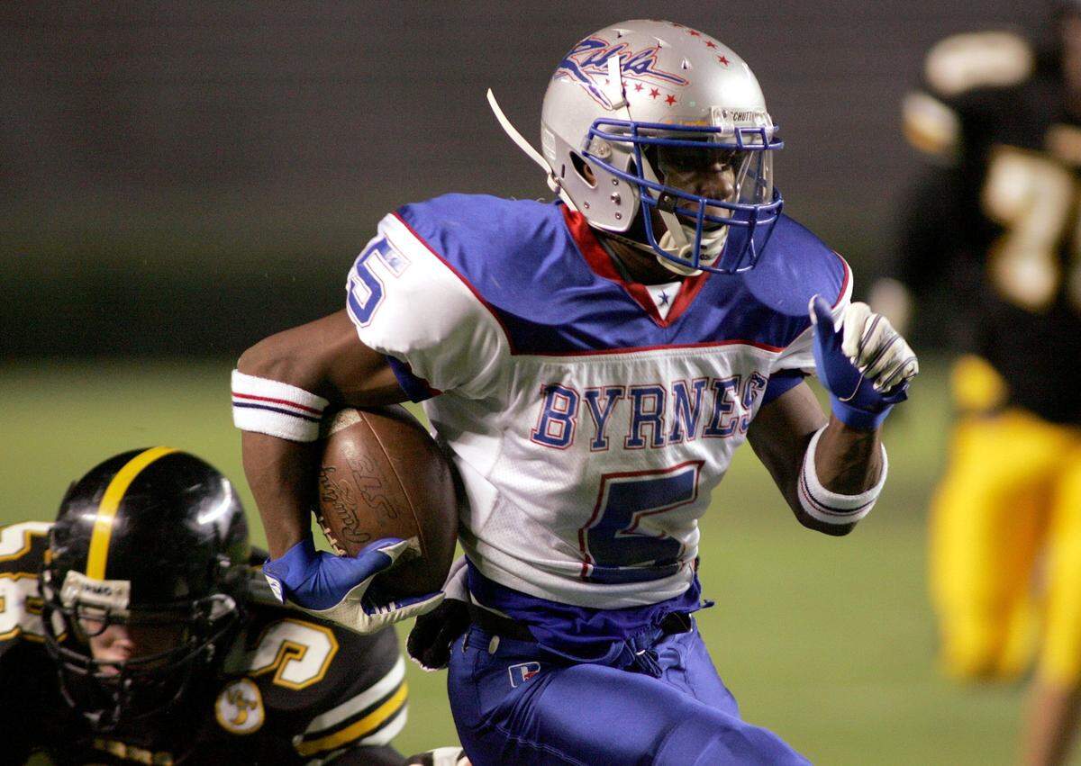 From 2004: Prince Miller of Byrnes High runs past the Irmo defense for a touchdown.