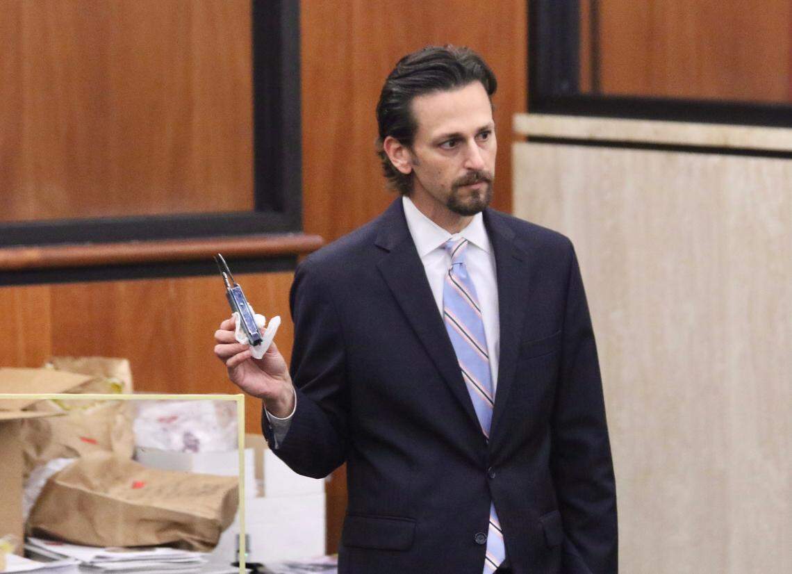 Prosecutor Dan Goldberg shows a multi-tool that prosecutors have entered into evidence in the murder trial for Nathaniel Rowland, accused of killing USC student Samantha Josephson, during the trial on Friday, July 23, 2021.