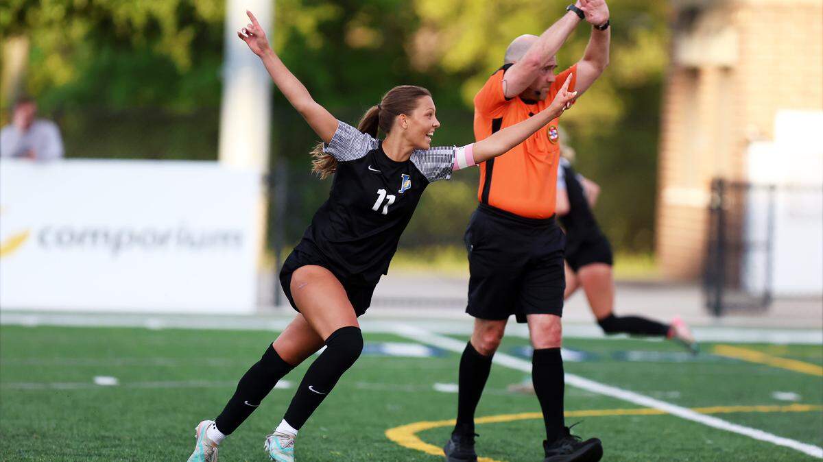 Lexington soccer's Adriana Dunat scores the go-ahead goal Tuesday in the home playoff game against River Bluff.
