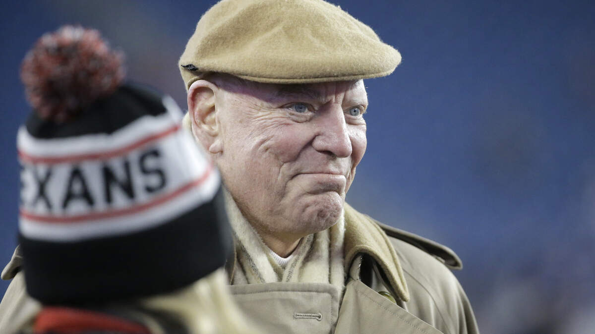 Houston Texans owner Robert McNair stands on the field before an NFL divisional playoff football game against the New England Patriots, Saturday, Jan. 14, 2017, in Foxborough, Mass.