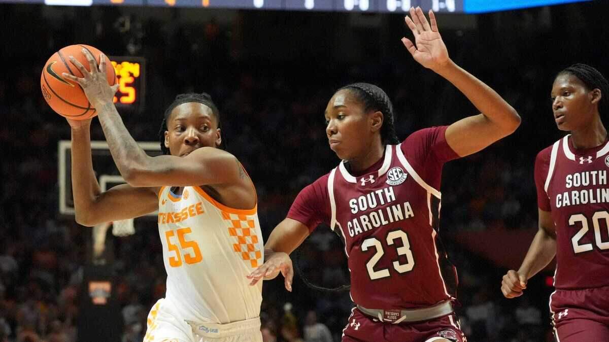 Tennessee’s Talaysia Cooper (55) tries to get to the basket while guarded by South Carolina’s Bree Hall (23) during an NCAA college basketball game on Monday, Jan. 27, 2025, in Knoxville, Tenn.