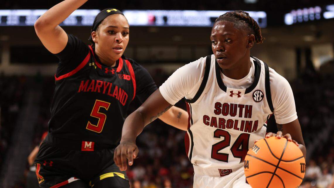 South Carolina forward Sahnya Jah (24) pushes toward the basket as Maryland guard Brinae Alexander (5) defends during the second half of the Gamecocks’ game against the visiting Terrapins at Colonial Life Arena on Sunday, November 12, 2023.