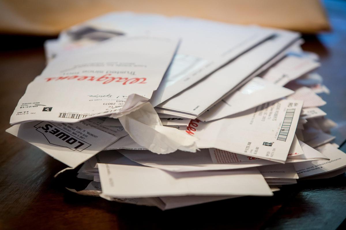 A stack of bills for the care of Jodie Roberts. Roberts is in a vegetative state after being without oxygen for roughly twenty minutes while giving birth to her son in July 2018.