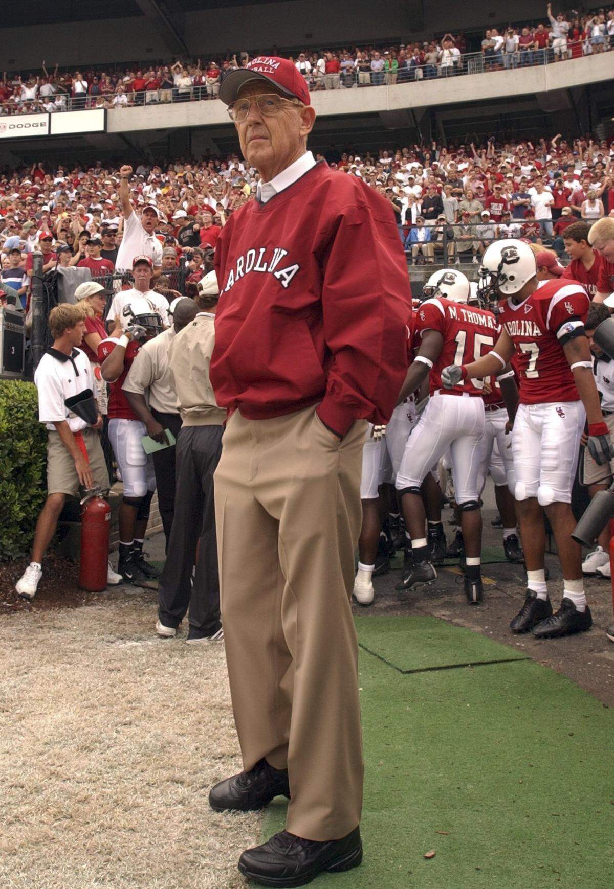 As the theme to "2001" plays, University of South Carolina head coach Lou Holtz watches the crowd cheer before the Gamecocks go on to defeat Virginia 31-7 at Williams Brice Stadium on Saturday Sept. 6, 2003. 