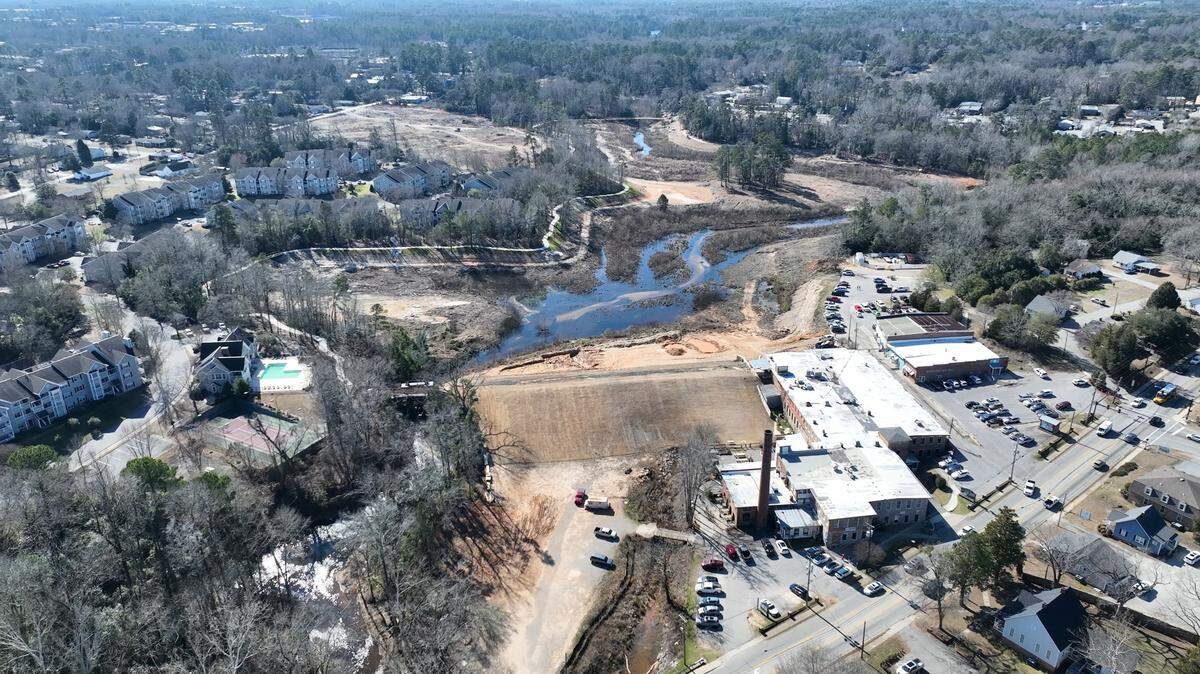 A walking trail around Lexington’s Old Mill Pond will open to the public once the pond, drained by a 2015 dam failure, is refilled.