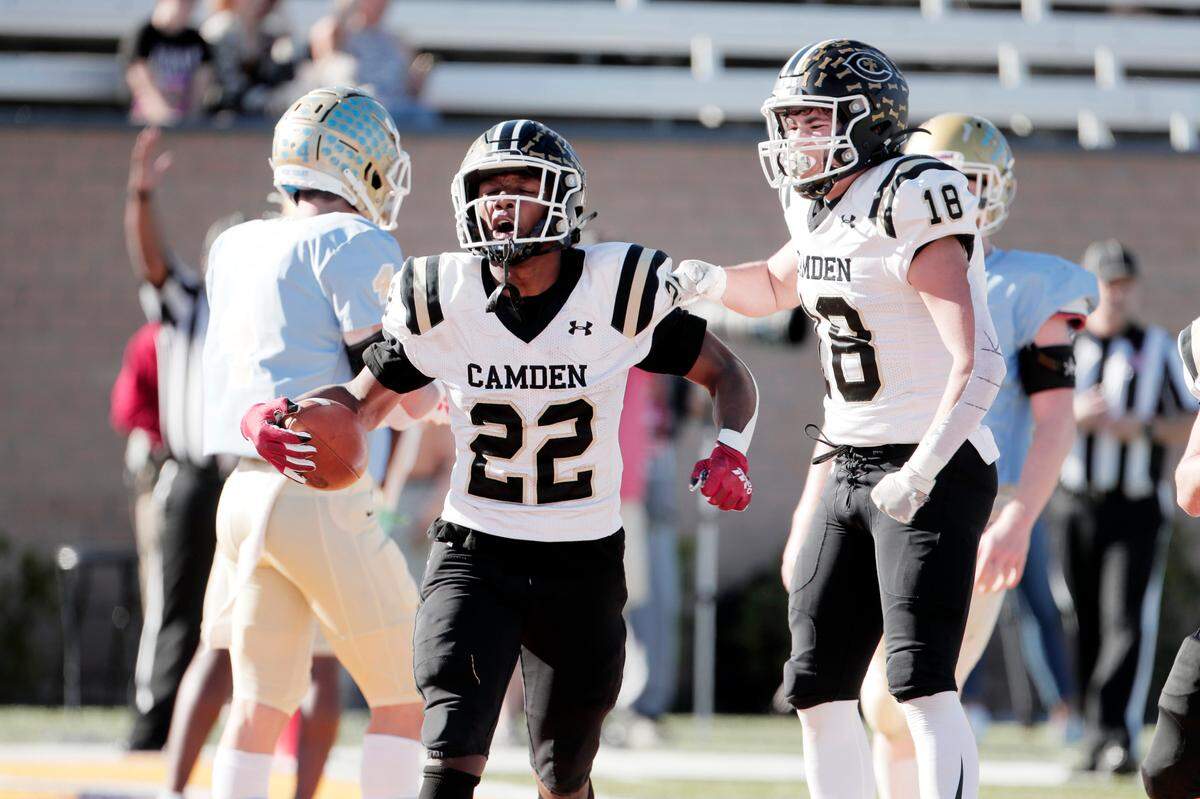 Daniel’s JaQuarius Mayrant 22 celebrates scoring against Camden at Benedict College on Friday, December 3, 2021.