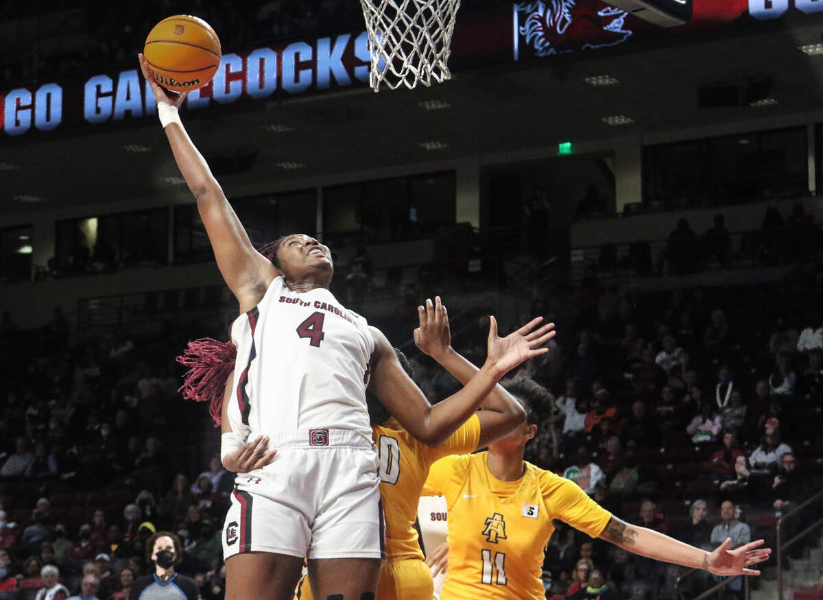 South Carolina’s Aliyah Boston (4) shoots as North Carolina A&T’s Kiana Adderton (11) and Jazmin Harris (40) during the first half of action on Monday, Nov. 29, 2021 in the Colonial Life Arena.