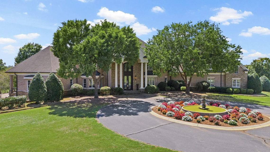 A long drive leads to the 16,000-square-foot house.