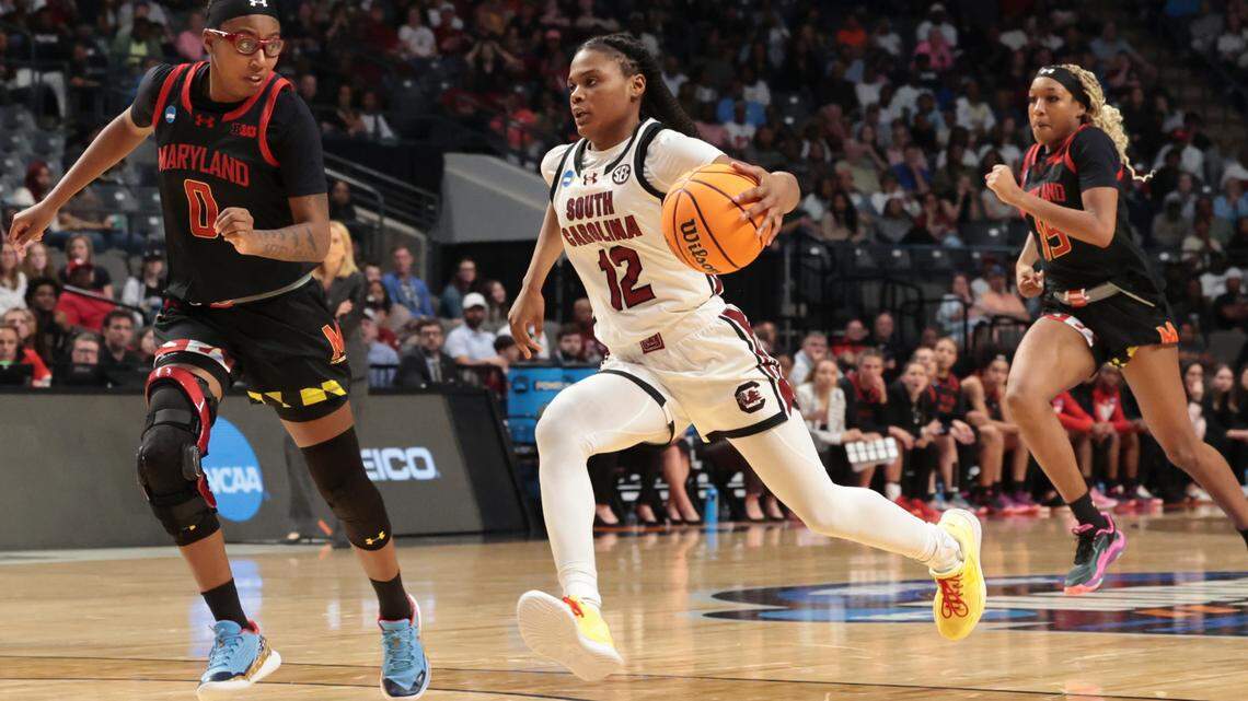University of South Carolina’s MiLaysia Fulwiley (12) drives down the court as Maryland Terrapins’ Shyanne Sellers (0) pressures during the second half of action at the Legacy Arena in Birmingham on Friday, March 28, 2025 in the Birmingham 2 regional of the NCAA Tournament.