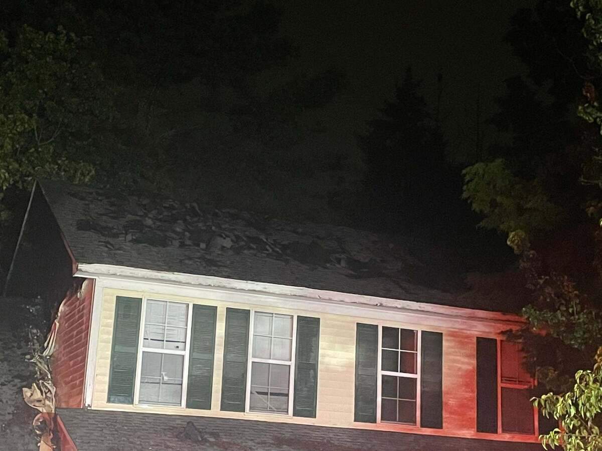 Members of the Columbia Fire Department respond to a house fire.