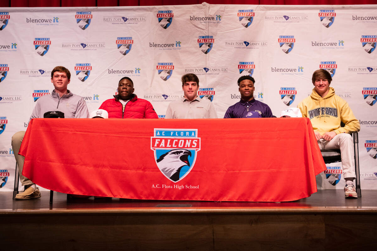AC Flora football players sign their letters of intent on Feb. 1, 2023.