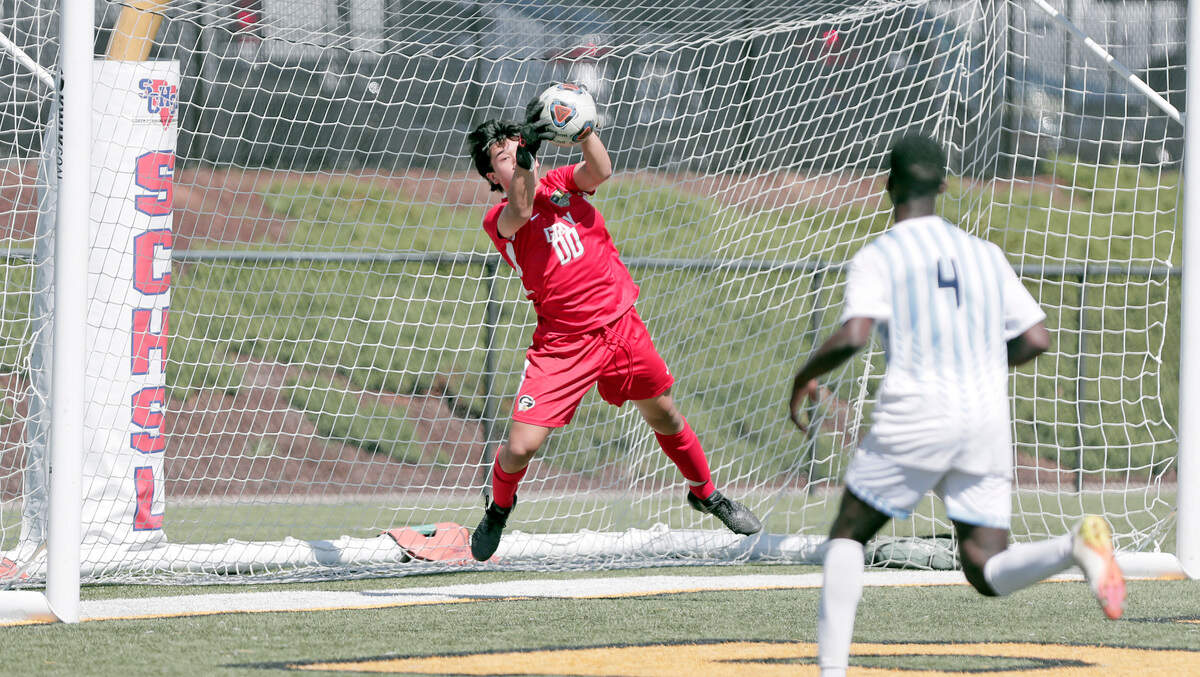 Gray Collegiate goalie Joey Sullivan records a save against Christ Church during the 2022 Class 2A boys soccer state championship match Saturday, held at Irmo High School.
