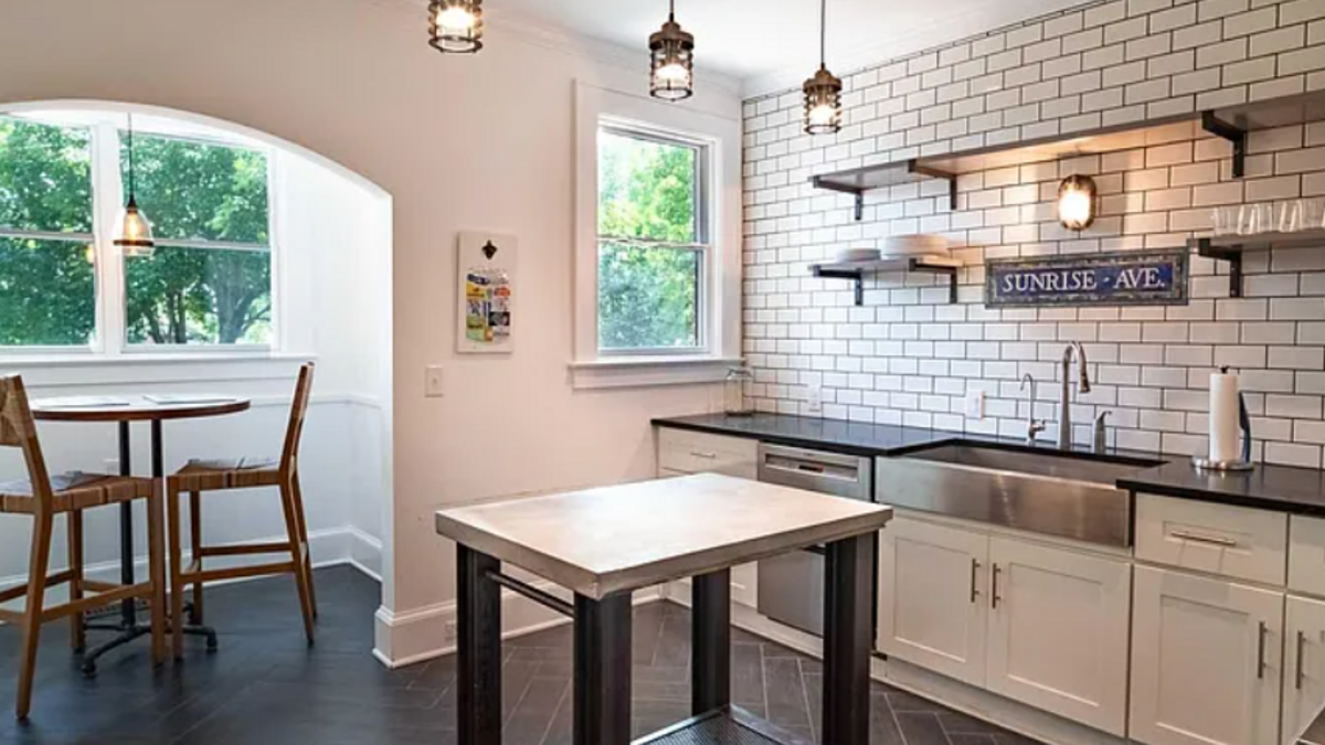 A 4-bedroom home at 100 Sunrise Ave., in Shandon with a walk-in closet and farmhouse kitchen fixtures is listed for sale on Zillow July 15, 2026.