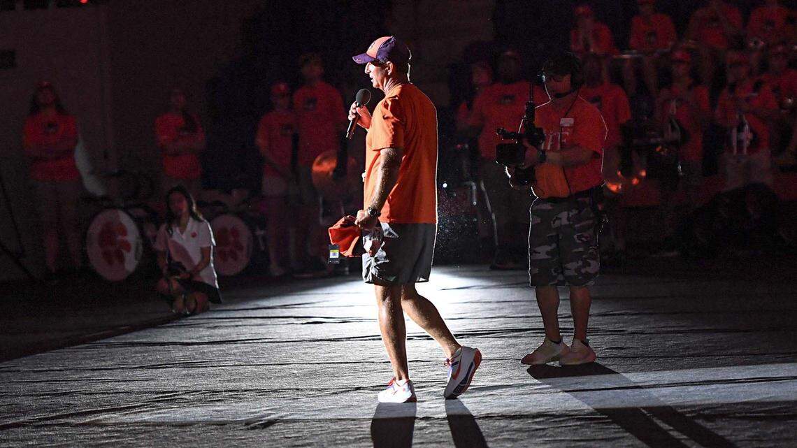 Clemson football head coach Dabo Swinney welcomes new students and tosses t-shirts and a football into the crowd, during the Clemson University Athletics Showcase portion of the New Student Convocation in Littlejohn Coliseum in Clemson, S.C. Friday, August 21, 2023. Coaches from each sport welcomed the new students and threw souvenirs in the crowd.