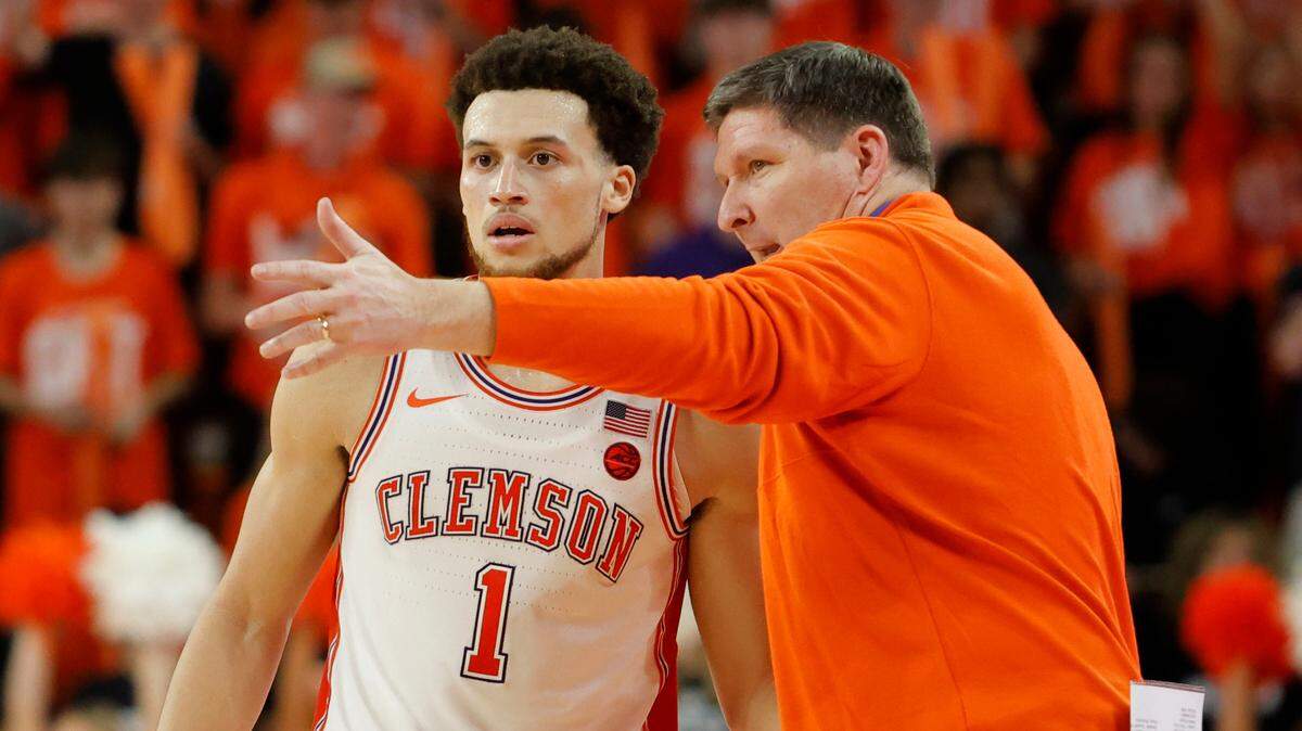 Clemson head coach Brad Brownell and guard Chase Hunter