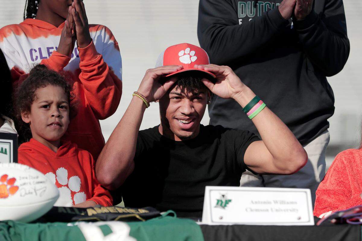 Dutch Fork High school’s Antonio Williams signs to play football at the Clemson on Wednesday, December 15, 2021. 