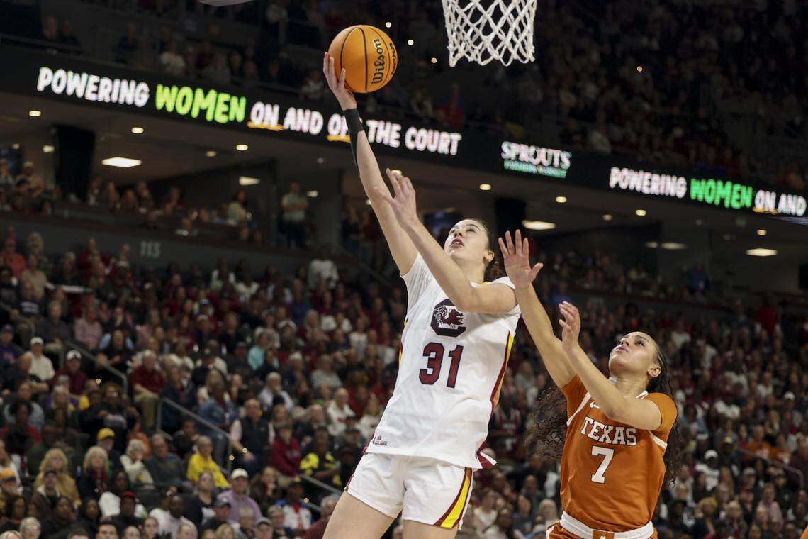 South Carolina's Alicia Tournebize (31) shoots as Texas’s Jordan Lee (7) defends during the first half of action of their women's basketball game in the SEC Tournament, against Texas at the Bon Secours Wellness Arena on Sunday, March 8, 2026.