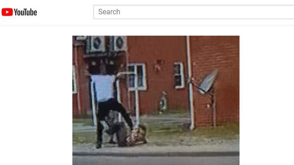 A video shows a man assaulting a pregnant woman before he was shot by another man.