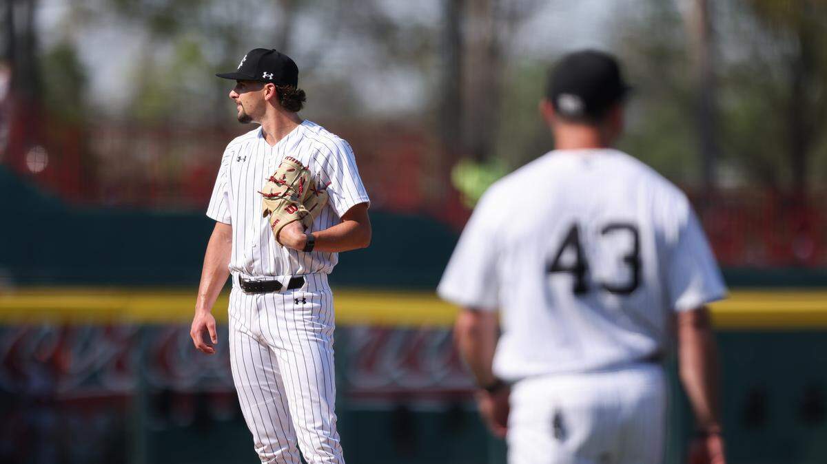 South Carolina pitcher Cooper Parks (41) looks around as interim head coach Monte Lee heads out for a pitcher change during the Gamecocks’ game against Arkansas at Founders Park in Columbia on Sunday, March 22, 2026.