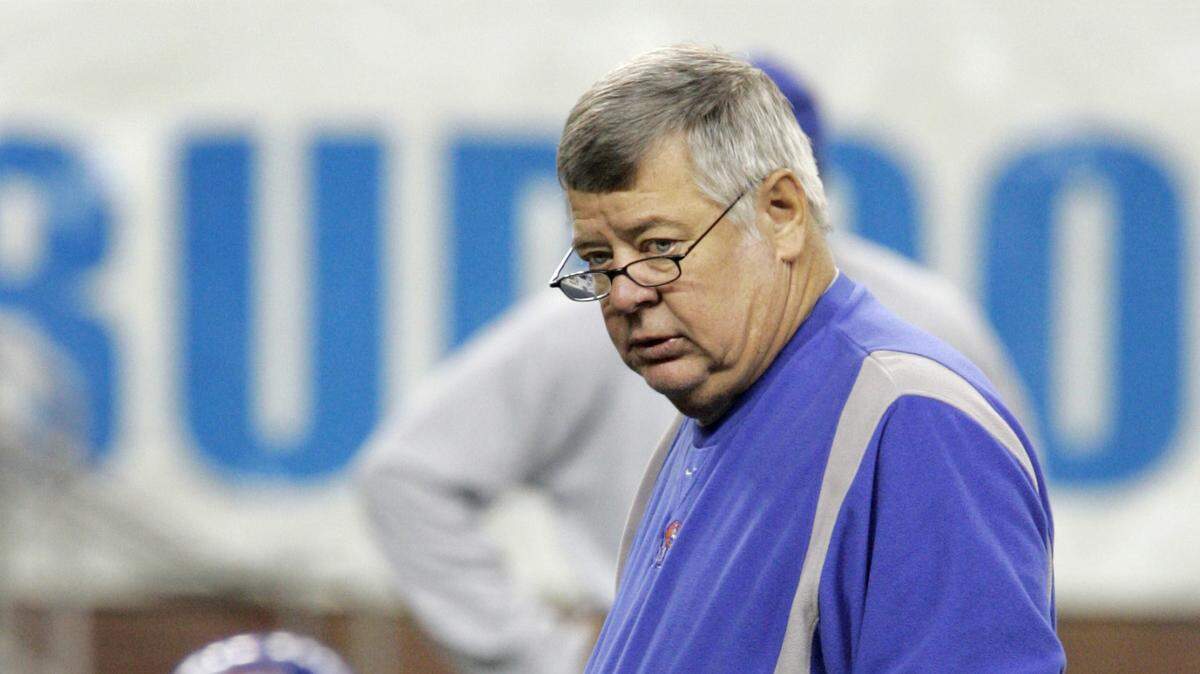 Memphis defensive coordinator Joe Lee Dunn looks over the team during their warmup drills at Ford Field in Detroit, Friday, Dec. 23, 2005. Memphis will play against Akron in the Motor City Bowl football game on Monday, Dec. 26, 2005. (AP Photo/Carlos Osorio)