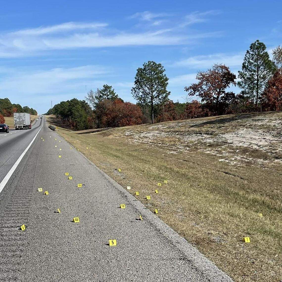 Evidence is marked following a shooting.