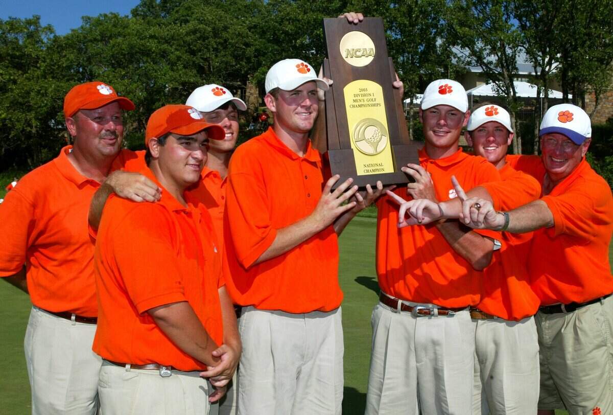 From 2003, the Clemson golf team wins the men’s NCAA Division I championships at Karsten Creek Golf Club in Stillwater, Oklahoma. From left are coach Larry Penley, Jack Ferguson, Matt Hendrix, D.J. Trahan, Ben Duncan, Gregg Jones and academic advisor Joe White.