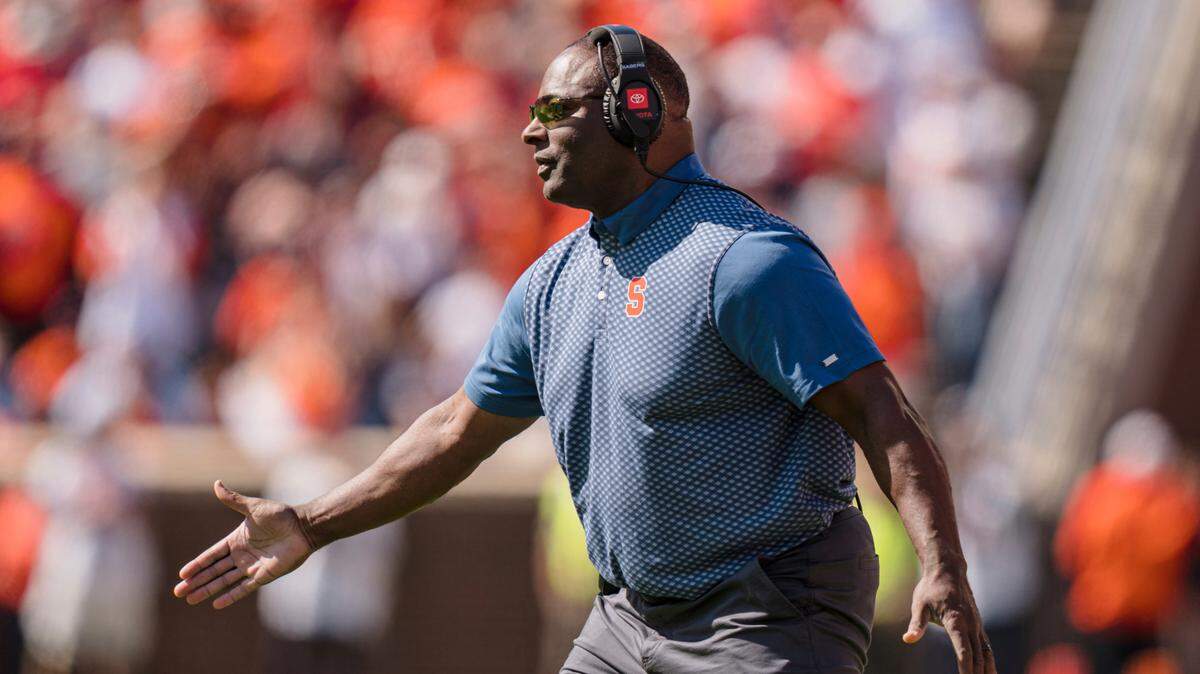 Syracuse head coach Dino Babers looks on during the first half of an NCAA college football game against Clemson on Saturday, Oct. 22, 2022, in Clemson, S.C.