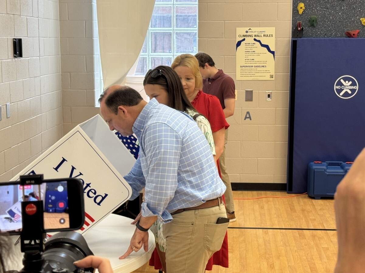 Attorney General Alan Wilson votes in the runoff with his family at New Providence Elementary School in Lexington on June 23, 2026.