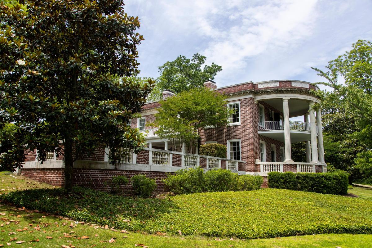 The Lyles-Gudmundson House, a home on the National Register of Historic Place, on Seneca Avenue in the Wales Garden neighborhood on Wednesday May 13, 2020. The home was built in the Classical Revival style, with Doric columns and Roman inspired wreathes sculpted from marble.