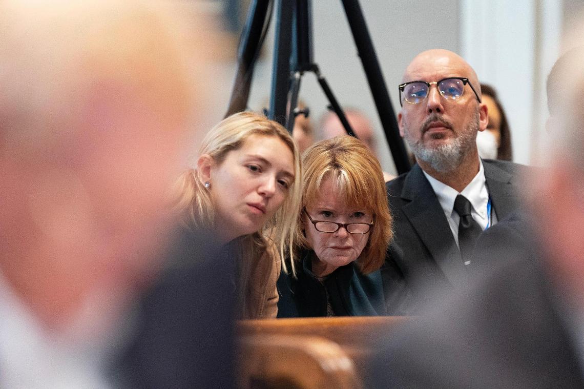 Reporters Elizabeth Campbell, Carol Gable and Will Folks strain to see video evidence on computer monitors during Alex Murdaugh’s trial for murder at the Colleton County Courthouse on Thursday, January 26, 2023. Joshua Boucher/The State/Pool