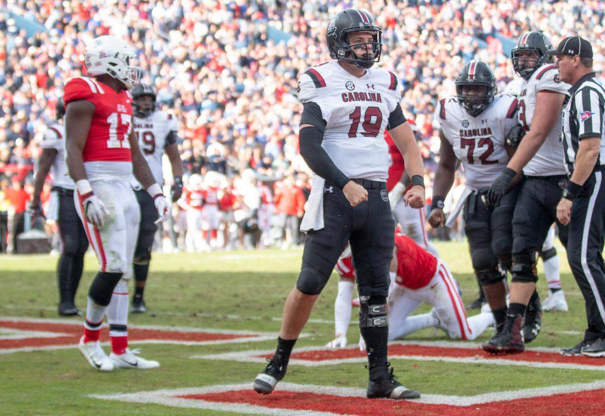 South Carolina Gamecocks quarterback Jake Bentley (19) flexes after scoring a touchdown during the game against Ole Miss at Vaught-Hemingway Stadium Saturday, Nov. 3, 2018, in Oxford, Mississippi.