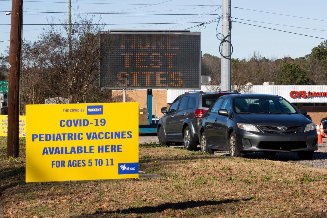 Dozens of people wait in their cars for coronavirus tests and vaccines at the Department of Health and Environmental Control on Tuesday, January 4, 2023.