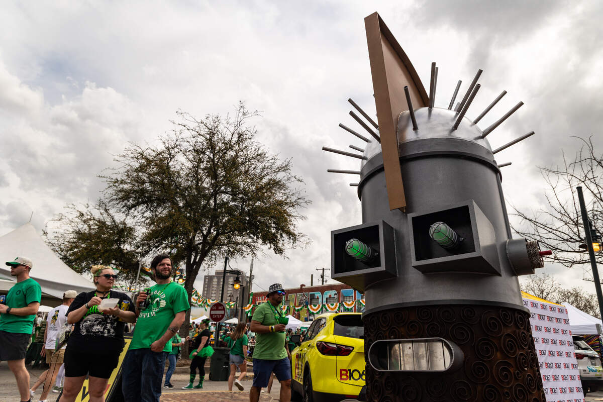 Fritz the Robot’s eyes glow green during the St. Pat’s in Five Points festival in Columbia, South Carolina on Saturday, March 15, 2025.