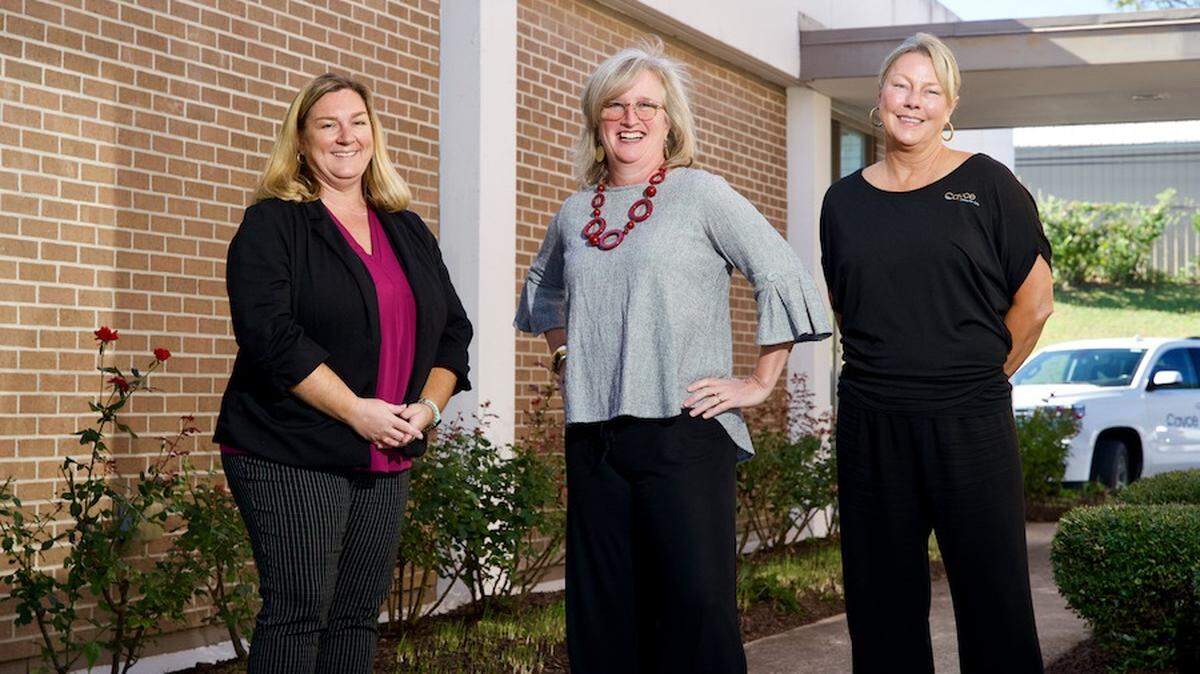 Cayce City Manger (left) Tracy Hegler stands with Mayor Elise Partin (middle) and Municipal Clerk Mendy Corder