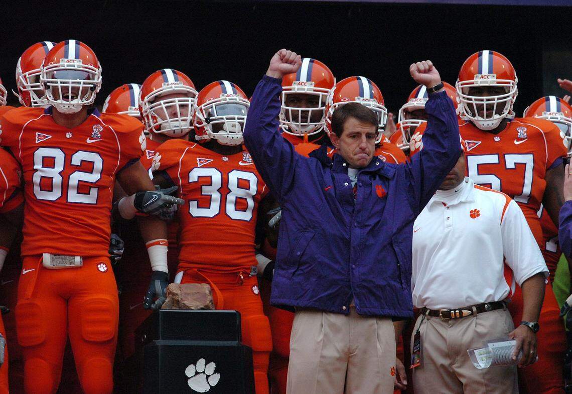 Clemson interim head coach Dabo Swinney stands with his team before running down the hill Saturday, November 29, 2008 at Clemson’s Memorial Stadium. Clemson South Carolina Football