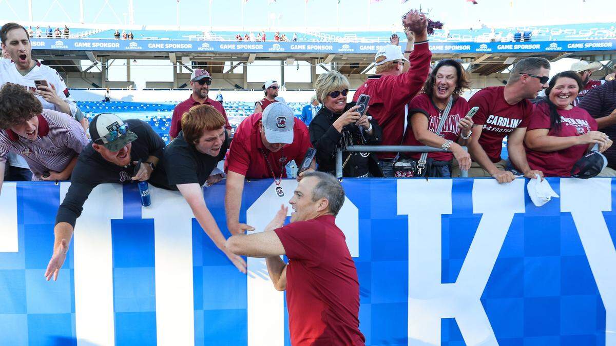 South Carolina Gamecocks head coach Shane Beamer celebrates with fans after the Gamecocks beat the Wildcats 31-6 Saturday, Sept. 7, 2024 at Kroger Field in Lexington, Ky.