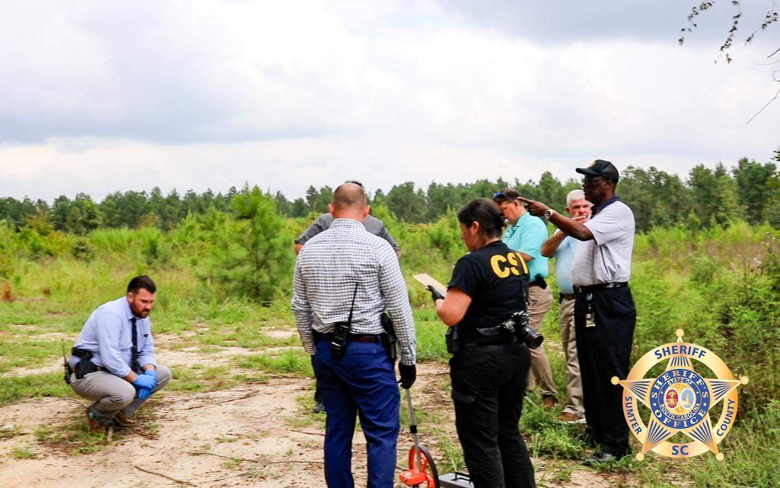 Officials investigate after two bodies were discovered.