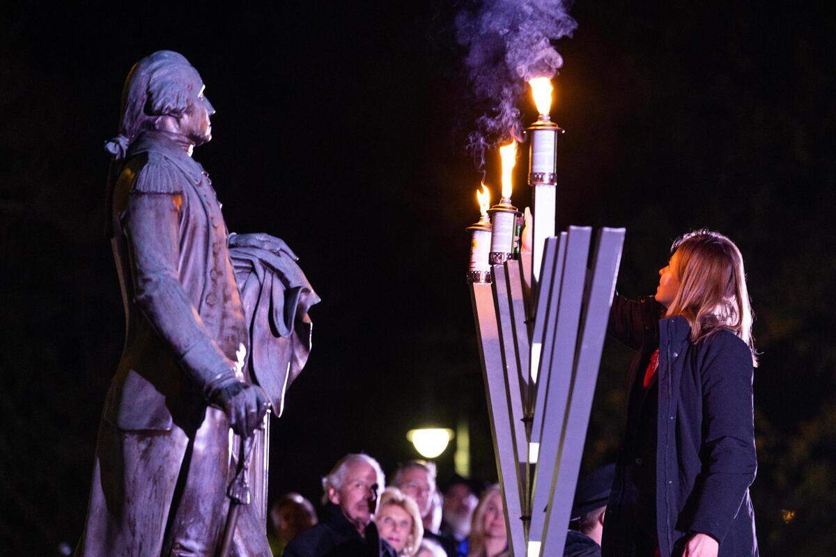 Ana Sazonov lights South Carolina’s menorah on the second night of Hanukkah at the South Carolina State House on Monday, December 19, 2022. Civis and religious leaders spoke about the importance of the holiday and fighting anti-semitism, before the traditional lighting of candles and latkes.