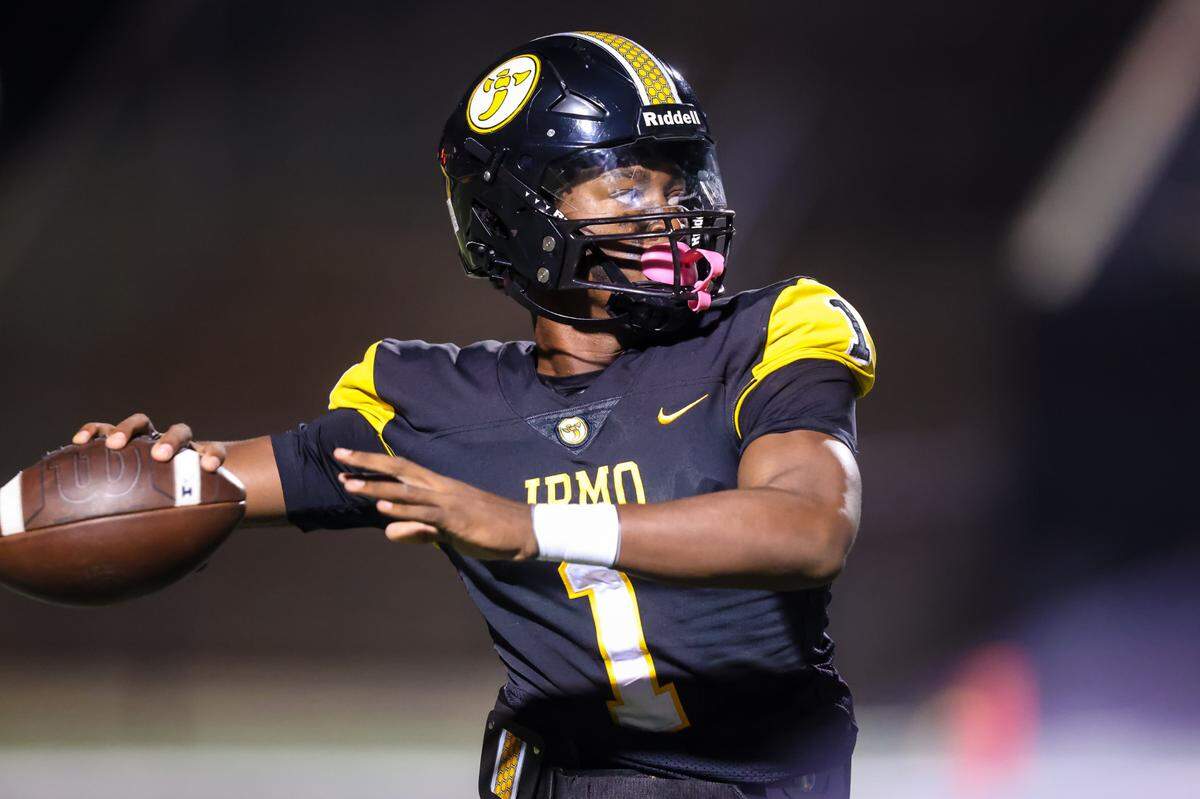 Irmo Yellow Jackets quarterback Aaron “AJ” Brand (1) passes against River Bluff on Oct. 11.