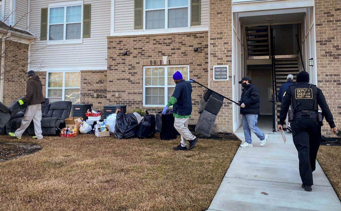 Sergeant Erin Hill from the Richland County Sheriff’s Office enters an apartment where an ejectment has been ordered. Although there is currently a federal eviction moratorium in place, Hill said her unit carries out between 10 to 15 evictions a week.