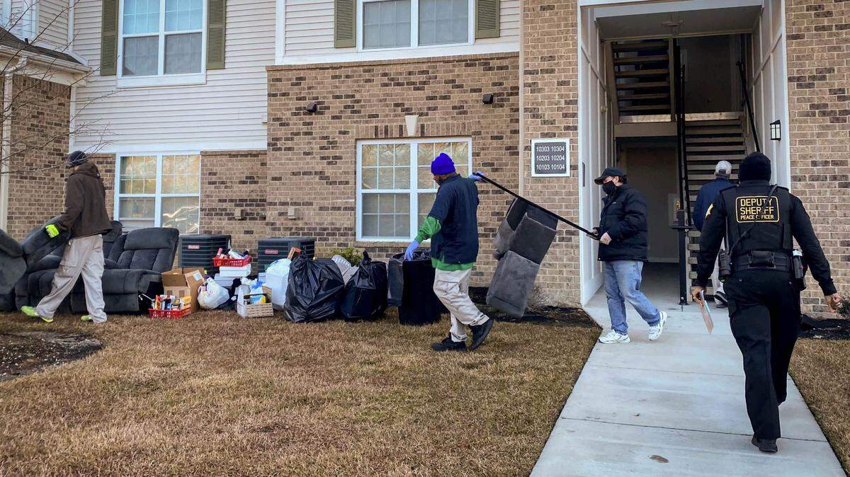 Sergeant Erin Hill from the Richland County Sheriff’s Office enters an apartment where an ejectment has been ordered. Although there is currently a federal eviction moratorium in place, Hill said her unit carries out between 10 to 15 evictions a week.