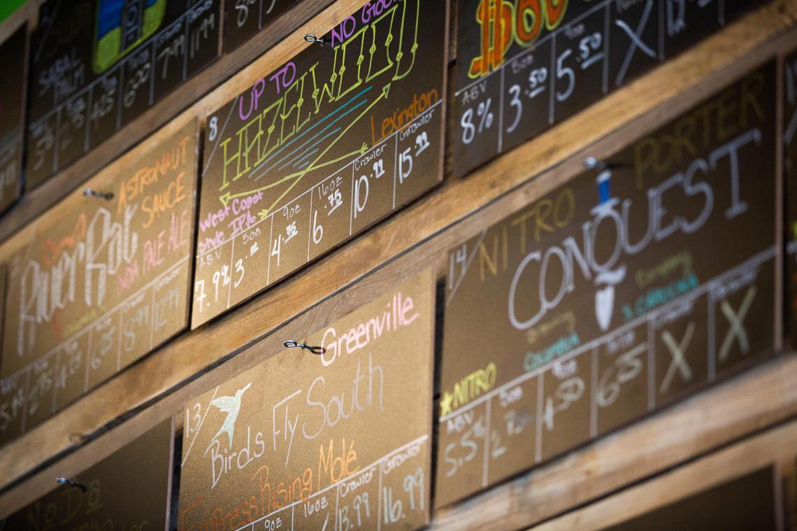 A board above the bar at Craft and Draft’s new location at 7583 St. Andrews Road in Irmo shows a mix of South Carolina and national beers on tap on Thursday, January 16, 2020. Co-owner Andrew Johnson says that the new location will fill a need in Irmo.