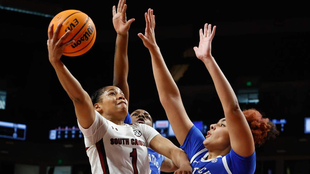 South Carolina’s Zia Cooke (1) shoots as Kentucky’s Treasure Hunt (12) and pressure during the first half of action on Sunday, Jan. 9, 2022 in the Colonial Life Arena.