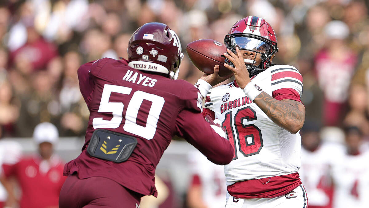 LaNorris Sellers #16 of the South Carolina Gamecocks throws a pass against Dayon Hayes #50 of the Texas A&M Aggies during the first quarter at Kyle Field on November 15, 2025 in College Station, Texas.