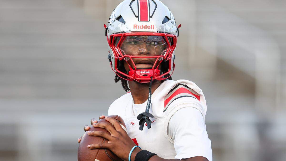 J'Zavien Currence (0) of South Pointe warms up before AC Flora’s game against South Pointe at Memorial Stadium on Friday, September 19, 2025.