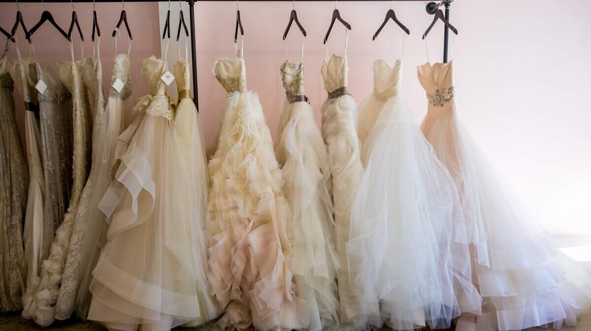 Wedding dresses on display at London & Lace bridal shop on Devine Street. Devine Street businesses are banding together to create a wedding district that will allow brides to park and walk while picking out dresses, invitations, flowers, bridesmaids’ gifts, etc., for their big day at locally owned shops.