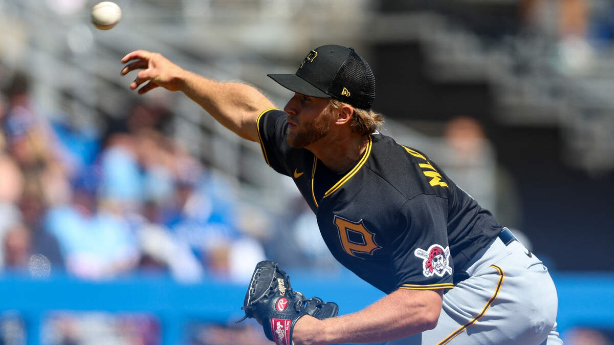 Pittsburgh Pirates pitcher Camron Mlodzinski (71) throws a pitch against the Toronto Blue Jays in the fifth inning during spring training at TD Ballpark. He made his major league debut on June 16, 2023.