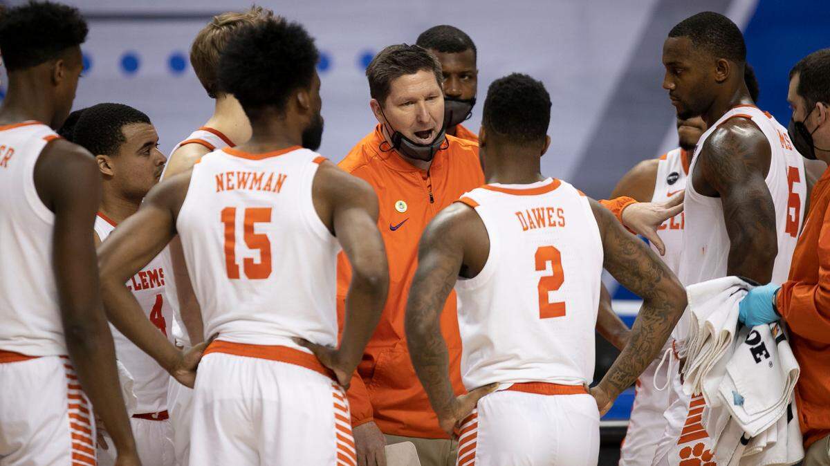 Clemson coach Brad Brownell huddles with his team during final seconds against Miami on Wednesday, March 10, 2021 during the ACC Tournament at the Greensboro Coliseum in Greensboro, N.C.