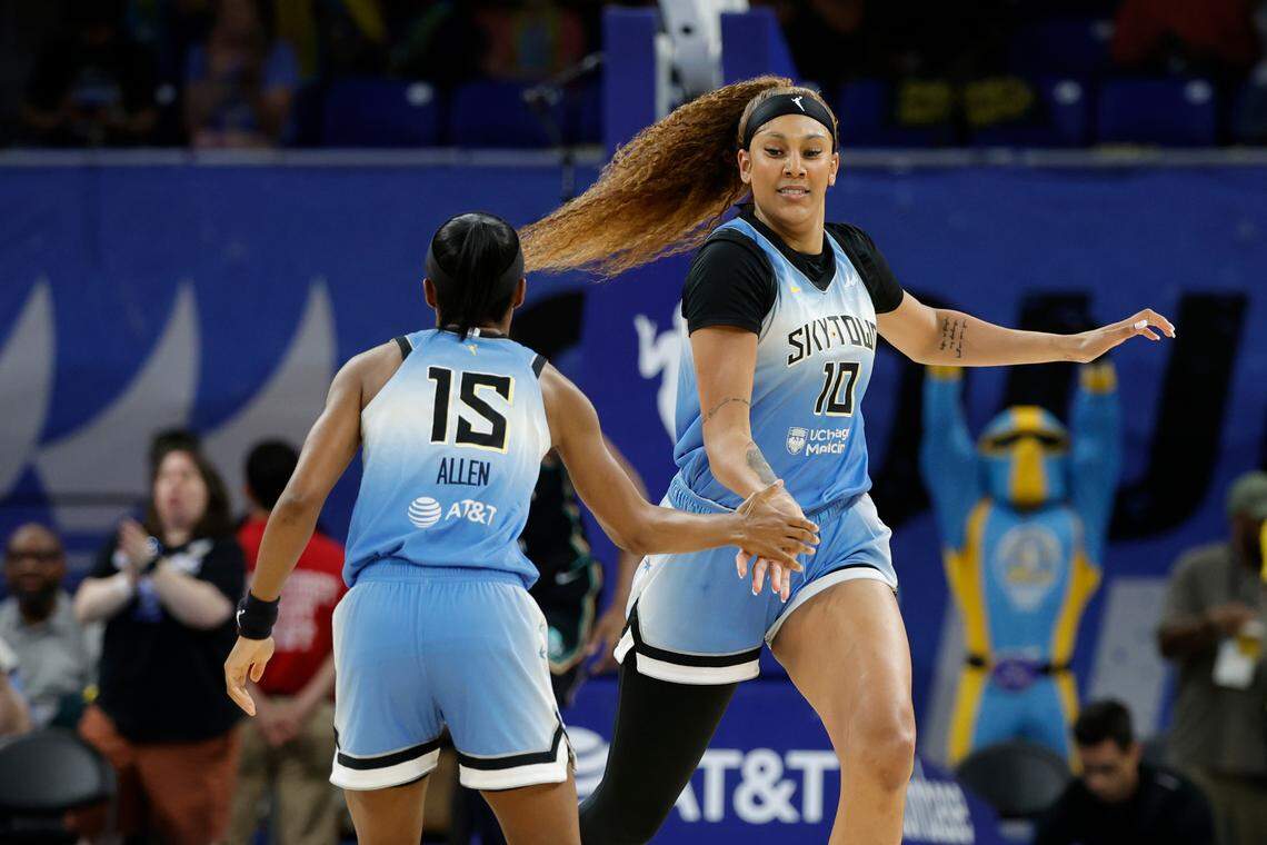 Chicago Sky center Kamilla Cardoso (10) celebrates with guard Lindsay Allen (15) after scoring July 13 against the New York Liberty.