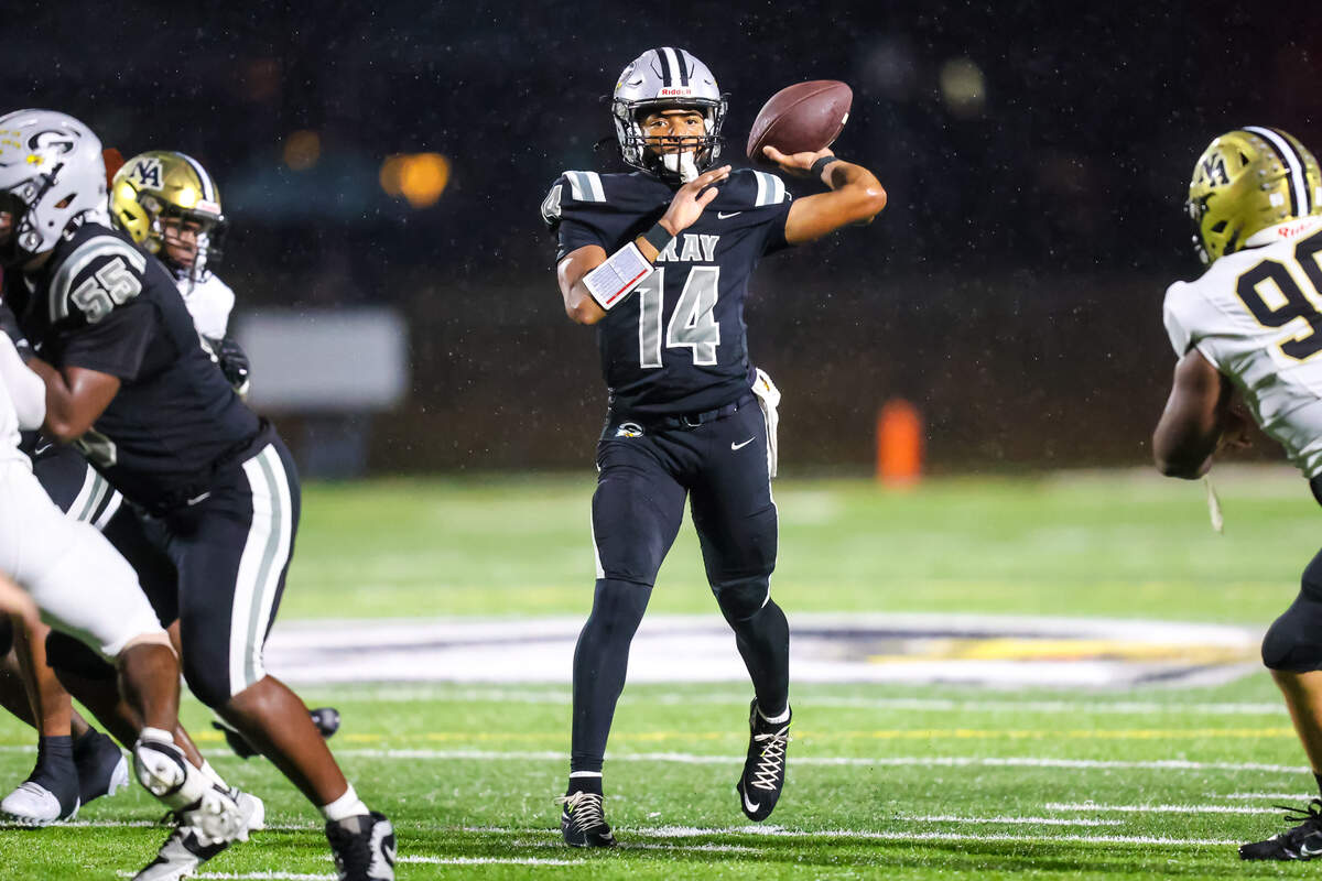 Gray Collegiate quarterback Xavier Wright (14) passes against North Augusta High during their game at Gray Collegiate Academy Friday night, 9/26/25.
